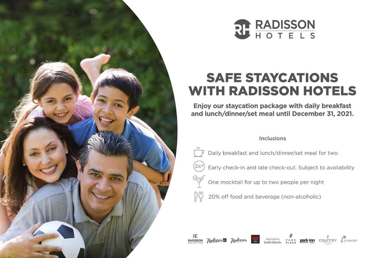Radisson Mumbai Andheri Midc Exterior foto A Radisson Hotels advertisement